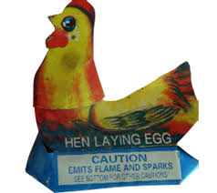 HEN LAYING EGGS
